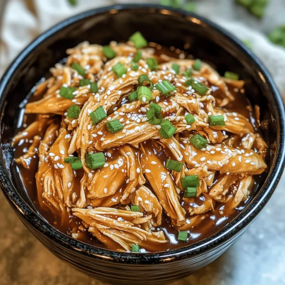 A bowl of food with a green garnish.