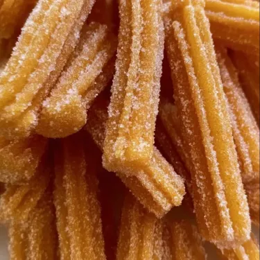 A pile of sugar coated straws.