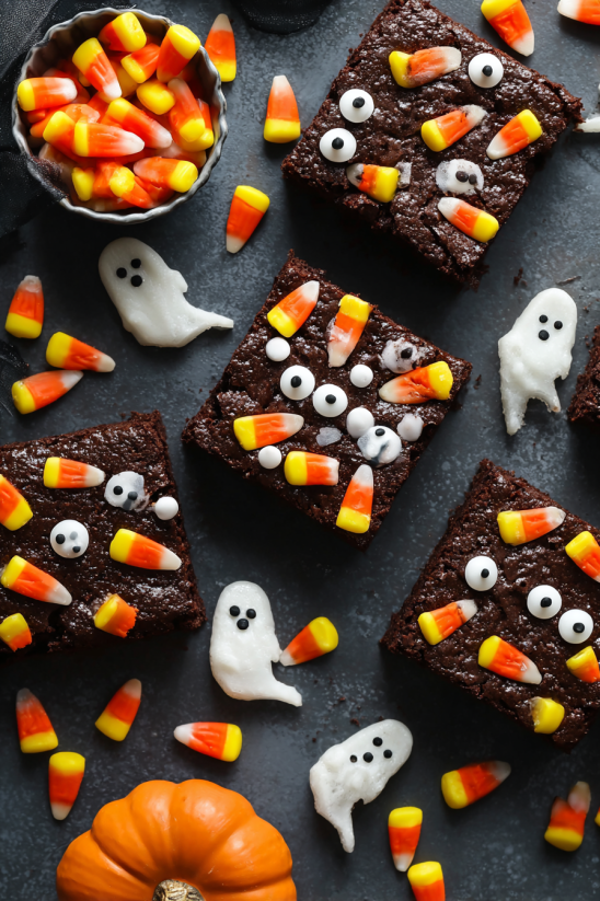 Brownies with candy and ghost decorations.