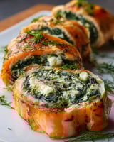 Spinach and feta stuffed salmon pinwheels.